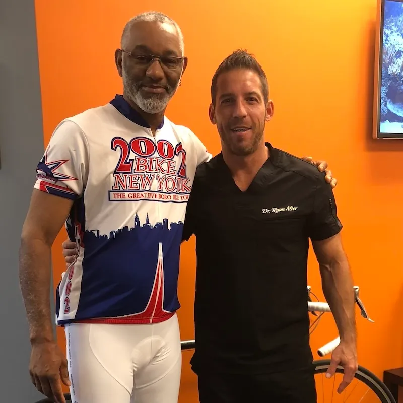 dr ryan alter with patient standing