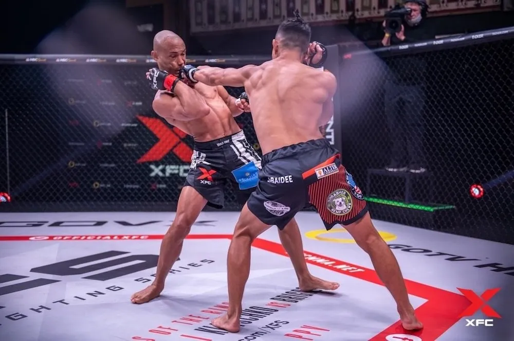 Andre Soukhamthath fighting in the XFC cage