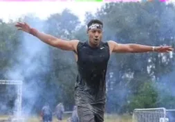 Stephan Simmons celebrating during a Spartan race